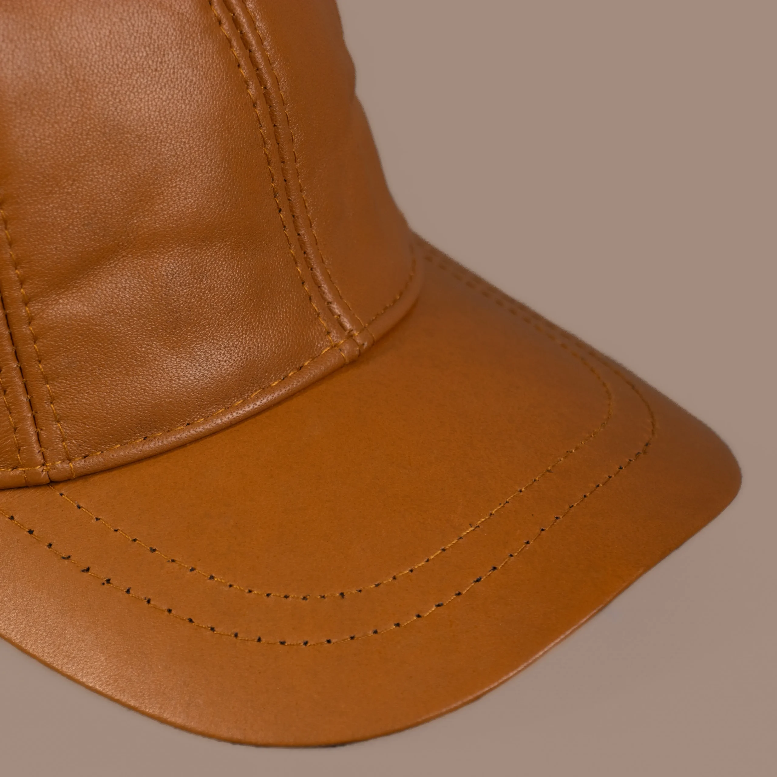 کلاه چرم طبیعی تبریز مدل کپ تام عسلی